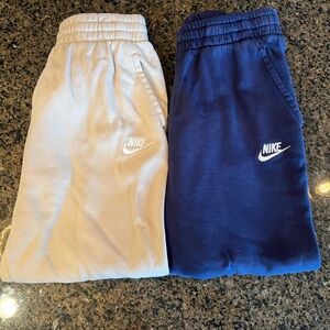 Nike Youth Large cuffed joggers in beige and navy blue - EUC